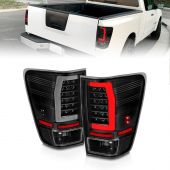 NISSAN TITAN 04-15 LED TAIL LIGHTS BLACK HOUSING CLEAR LENS WITH C LIGHT BAR (W/O UTILITY COMPARTMENT)