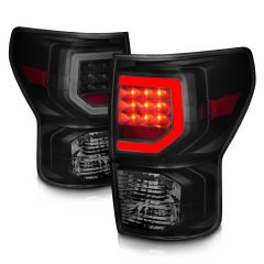 TOYOTA TUNDRA 07-13 LED TAIL LIGHTS WITH LIGHT BAR BLACK HOUSING SMOKE LENS (NOT COMPATIBLE WITH 2014 OLD BODY STYLE MODELS & NOT COMPATIBLE ON MODELS WITH FACTORY LED TAIL LIGHTS)